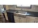 Kitchen showcasing stainless steel sink, modern appliances, and bright cabinetry at 3027 Nc Highway 210, Smithfield, NC 27577
