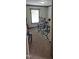 This workout room includes an elliptical machine and a weight bench at 3027 Nc Highway 210, Smithfield, NC 27577