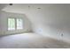 Bedroom featuring neutral walls, recessed lighting, and a double window showcasing the backyard view at 3325 Colby Chase Dr # 9, Apex, NC 27539