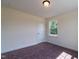 Well-lit bedroom featuring neutral walls and carpet at 6104 Sunset Lake Rd, Fuquay Varina, NC 27526