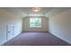 Bedroom with vaulted ceiling and window at 6104 Sunset Lake Rd, Fuquay Varina, NC 27526