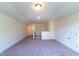 Spacious bonus room with carpet and vaulted ceiling at 6104 Sunset Lake Rd, Fuquay Varina, NC 27526