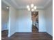 Open dining room with hardwood floors and kitchen views at 6104 Sunset Lake Rd, Fuquay Varina, NC 27526