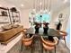 Contemporary dining room features stylish lighting, modern decor, and an open floor plan leading to kitchen at 2117 Opulent Oaks Ln # 15, Durham, NC 27713