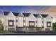 Modern townhome boasts multi-story architecture, neutral color palette, a private garage and manicured landscaping at 2117 Opulent Oaks Ln # 15, Durham, NC 27713