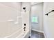 Bathroom featuring a tub and shower combination with modern fixtures at 2613 Silver Gate Ct, Wake Forest, NC 27587