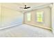 Bedroom with carpet, a ceiling fan, and natural light from two windows at 2613 Silver Gate Ct, Wake Forest, NC 27587