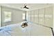 Serene bedroom with panel accent wall and lots of natural light at 2613 Silver Gate Ct, Wake Forest, NC 27587