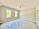 Bedroom features two large windows and a ceiling light at 2613 Silver Gate Ct, Wake Forest, NC 27587