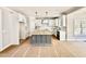 Spacious unfinished kitchen with a central island, white cabinetry and stainless steel appliances at 2613 Silver Gate Ct, Wake Forest, NC 27587