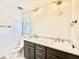 Elegant bathroom featuring double sinks with granite countertops and modern fixtures at 2617 Silver Gate Ct, Wake Forest, NC 27587