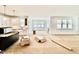 Open-concept living space connecting the kitchen, dining, and living areas at 2617 Silver Gate Ct, Wake Forest, NC 27587