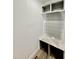 Mudroom with coat hooks, storage cabinets, and a bench at 2617 Silver Gate Ct, Wake Forest, NC 27587