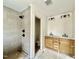 Spacious bathroom featuring a dual sink vanity, walk-in shower, and modern fixtures at 2621 Silver Gate Ct, Wake Forest, NC 27587