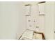 Bright laundry room with white cabinets and connections for a washer and dryer at 2621 Silver Gate Ct, Wake Forest, NC 27587