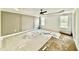 Large main bedroom showcasing decorative trim, ample natural light, and tray ceiling at 2621 Silver Gate Ct, Wake Forest, NC 27587