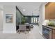 Stylish basement rec room with a built-in wet bar and seating area at 7640 Falls Creek Ln, Raleigh, NC 27614