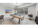 Game room with a pool table and ample space for entertainment at 7640 Falls Creek Ln, Raleigh, NC 27614