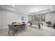 Game room featuring a pool table and comfortable seating at 7640 Falls Creek Ln, Raleigh, NC 27614