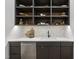 Butlers pantry with white shaker cabinets and quartz countertops at 7640 Falls Creek Ln, Raleigh, NC 27614