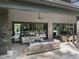Relaxing outdoor living space with comfortable seating and dining area, perfect for enjoying the outdoors at 7640 Falls Creek Ln, Raleigh, NC 27614
