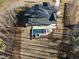 An elevated view of the home and the beautiful pool area at 7640 Falls Creek Ln, Raleigh, NC 27614