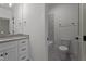 Bathroom featuring sink with white cabinets, a toilet, and a shower/tub combo at 330 Hidden Lake Dr, Youngsville, NC 27596