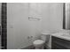 Bathroom with gray cabinets and a toilet at 330 Hidden Lake Dr, Youngsville, NC 27596