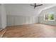 Spacious bonus room featuring hardwood floors and a window at 330 Hidden Lake Dr, Youngsville, NC 27596