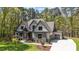 Desirable two-story home with an attached garage and a lush green front lawn at 330 Hidden Lake Dr, Youngsville, NC 27596