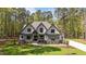 Two story home with manicured lawn and neutral color scheme offers curb appeal at 330 Hidden Lake Dr, Youngsville, NC 27596