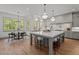 Open-concept kitchen with large kitchen island, breakfast nook, and stainless steel appliances at 330 Hidden Lake Dr, Youngsville, NC 27596