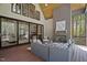 Cozy screened porch with wood burning fireplace, comfortable seating, and outdoor views at 330 Hidden Lake Dr, Youngsville, NC 27596