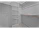 Bright walk-in closet with shelving at 330 Hidden Lake Dr, Youngsville, NC 27596
