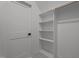 Walk-in closet featuring shelving at 330 Hidden Lake Dr, Youngsville, NC 27596