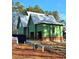 New home under construction with Zip System sheathing, brick base and a two car garage on a sunny day at 3331 Colby Chase Dr # 8, Apex, NC 27539