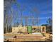 New home construction framing with blue sky and trees in the background at 3340 Colby Chase Dr # 2, Apex, NC 27539