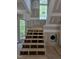 Partially built staircase showcasing open risers and access to natural light from adjacent windows at 3340 Colby Chase Dr # 2, Apex, NC 27539