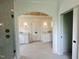 Spacious bathroom boasts dual vanities, arched ceiling with wood paneling, and a glass enclosed shower at 627 Georgetown Rd, Raleigh, NC 27608