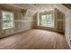 Bright bedroom with hardwood floors, built-in window seat and lots of natural light at 627 Georgetown Rd, Raleigh, NC 27608