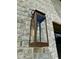 Exterior light fixture against a light brick wall at 627 Georgetown Rd, Raleigh, NC 27608