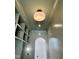 Tastefully decorated hallway featuring elegant lighting, built-in shelves, and an arched doorway at 627 Georgetown Rd, Raleigh, NC 27608