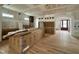 Open kitchen area with hardwood floors and cabinets awaiting installation at 627 Georgetown Rd, Raleigh, NC 27608