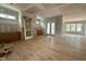 Spacious living room with hardwood flooring, recessed lighting, and large windows at 627 Georgetown Rd, Raleigh, NC 27608