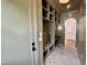 Hallway and mudroom featuring built-in storage, wood floors, and modern finishes at 627 Georgetown Rd, Raleigh, NC 27608