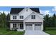 Charming two-story white brick home with attached two-car garage and a beautifully landscaped front yard at 204 E Whitaker Mill Rd, Raleigh, NC 27608