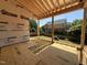 Framed deck and porch with view of the backyard and neighboring houses at 208 E Whitaker Mill Rd, Raleigh, NC 27608