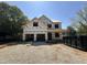 New construction home featuring a spacious two-story design with an attached two car garage at 208 E Whitaker Mill Rd, Raleigh, NC 27608