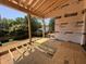 Under construction patio showing wood frame and lovely back yard view at 208 E Whitaker Mill Rd, Raleigh, NC 27608
