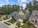 Aerial view of a charming neighborhood with green houses at 609 Meadowgrass Ln, Wake Forest, NC 27587